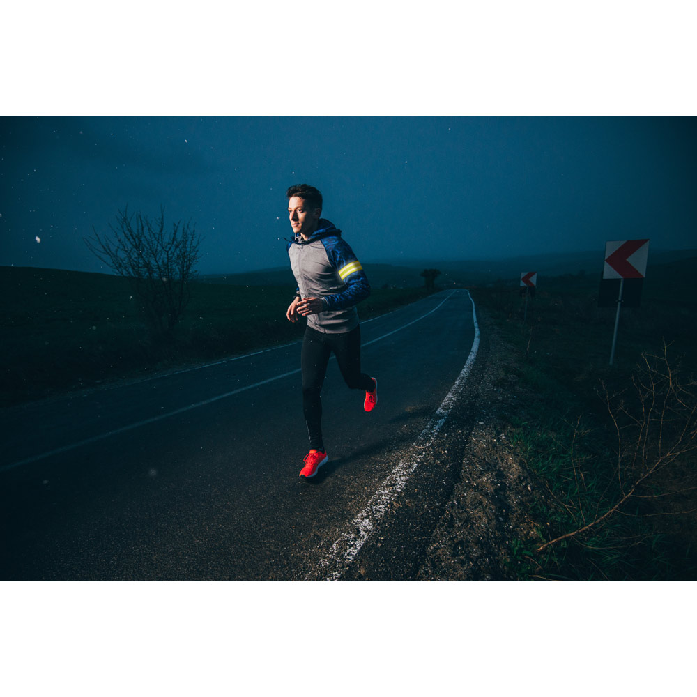 Man,Running,Outside,In,Nature,At,Rainy,Evening